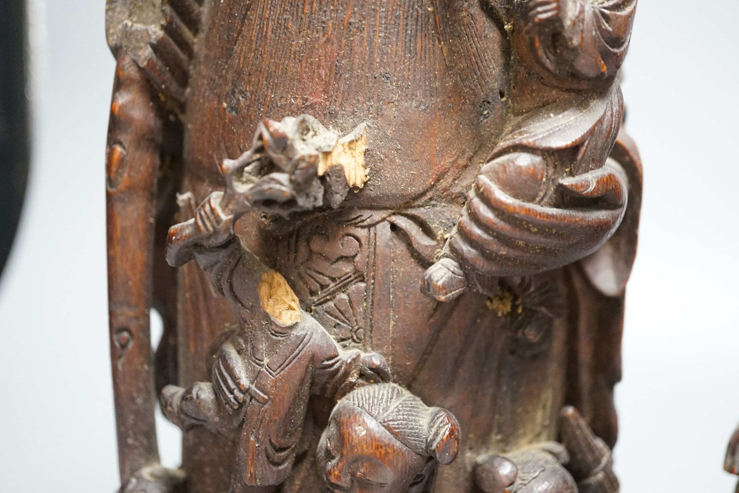 A 19th century Chinese bamboo figure of Shou Lao and a similar bamboo carving of a fisherman, 32 and 25cm, some losses